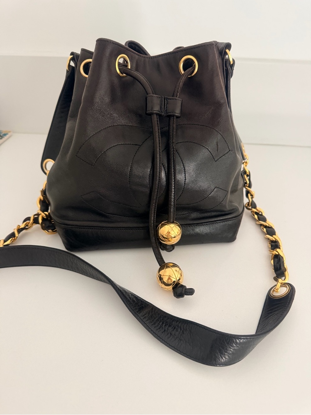 CHANEL Black Leather Drawstring Bucket Bag with Gold Hardware